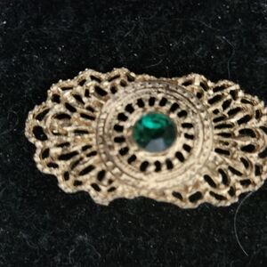 Vintage brooch in a gold filigree setting, go to jail the oak